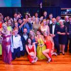 The cast and crew of Grease: The Arena Spectacular Live celebrate at the Otago Southland Theatre...