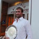 Nigel Woodhead, of Milton,  displays the Young Farmer  Otago-Southland regional final plate he...