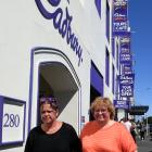 Cadbury factory machine operators Teresa Gooch (left) and Donna Bouma in Cumberland St yesterday....