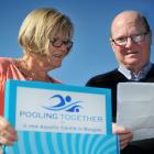 Taieri Communities Facility Trust chairwoman Irene Mosley and trust member Bill Feather read...