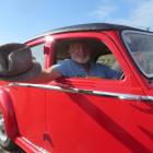 Brian Hosking, of Auckland, sits behind the wheel of his lovingly restored Riley  at this year’s...