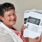 Sue Cousins, of Dunedin, with her Bruce Springsteen tickets. PHOTO: PETER MCINTOSH