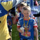 Finn Gilder (9) cools off after the race. 