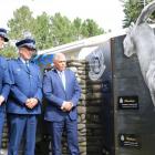 Constable Josh Robertson (left), Senior Const Bruce Lamb and Associate Justice Minister Mark...