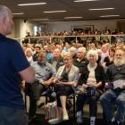 Gareth Morgan speaks to a packed audience at the Otago Museum's Hutton Theatre last night. Photo...