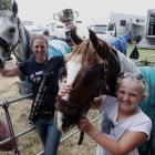 Abby Hore (left), of Beaumont Station, relaxes with her daughter Jess Hore after winning the...