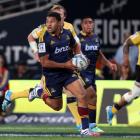 Lima Sopoaga of the Highlanders on the attack during the Super Rugby match between the...