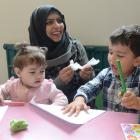 Fatima Hamad with her children Mays (1) and Mohammad (3) At-Taleb at the opening of the new Wild...
