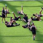 New Zealand Warriors team-mates train at Forsyth Barr Stadium in Dunedin yesterday in preparation...