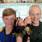 Taieri swimmer Harry Summers (10), of Mosgiel, and Kiwi swimmer Madison Wills (12), of Dunedin,...