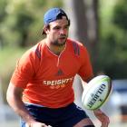 Highlanders lock Tom Franklin trains with the team yesterday at the University Oval. Photo by...