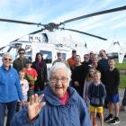 Alma McRobbie celebrates her 100th birthday in Mosgiel with her first helicopter ride yesterday. Photo: Stephen Jaquiery.