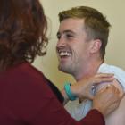 Otago University Students' Association president Hugh Baird receives an influenza vaccine from...