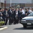 King's High School pupils perform a haka as the hearse carrying the coffin of Mitch Pereira leaves the grounds of the Dunedin school on Saturday. Photo by Gregor Richardson.