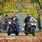 Ride of Respect participants Phil Scorringe (left) and AJ Todd at Queens Garden in Dunedin yesterday. Photo by Gerard O'Brien.