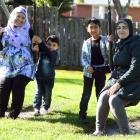 Enjoying themselves in a park in Brockville are (from left) Ahlam Safar, her son Ibrahem Abs (3),...