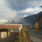 Firefighters at the scene in Queenstown. Photo Louise Scott