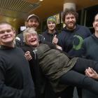 (From left) Bradley Caffell, Cowan Fearn, Wesley Bopp, Sam Beatson-Shaw and Lucas Hall hoist...