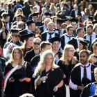 Graduands march down George St towards the Dunedin Town Hall where two University of Otago...
