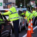 police_officers_test_motorists_at_a_checkpoint_on__4d1828a670.JPG
