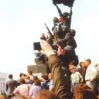 A crowd climbs a patriotic statue in Moscow during the 1991 coup attempt. Photo: supplied 