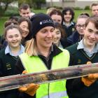Bayfield High School year 10 geography pupils examine a core ground sample taken by Van Walt...