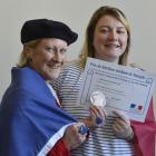 University of Otago senior lecturer in French Dr Pat Duffy and award-winning student Aleisha Lord, with her medal. Photo: Gerard O'Brien