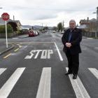 Mosgiel-Taieri Community Board member Martin Dillon at the intersection of Church and Wickliffe...