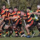 Zingari-Richmond loose forward Tom Rowe hits the ball up during a premier match against Green...
