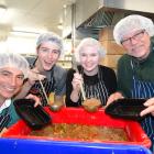 Cooking up a storm at the Coronet Peak ski area base building on Saturday are (from left) World...