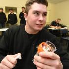 Jordan Trainor (19), of Dunedin, wires a plug on a motor in the Otago heats of the Master...