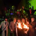 Lighting up the night at Oamaru’s Fire and Steam event yesterday are, from left, Martyn Collings,...
