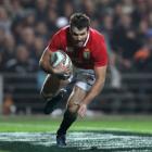 Jared Payne of the Lions goes over to score his team's third try. Photo: Getty