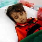 Girl infected with cholera lies on the ground at a hospital in Yemeni capital Sanaa. Photo: Reuters
