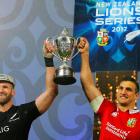 All Black captain Kieran Read (left) and Lions captain Sam Warburton jointly hoist the winner's...