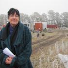 Adrienne Lamb, of Letts Gully Rd, near Alexandra, braves the cold after a power outage yesterday...
