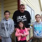 Brodie Cook  with his three children (from left) Memphis (11), Indiana (6) and Phoenix (8)...