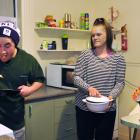 Bradley Quine (18), Kate Hyslop (17) and Karl Northey (19) cook dinner in their Dunedin flat last...