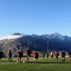 Lions players warm up during a training session at the Queenstown Event Centre today. Photo Getty