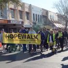 The Life Matters Suicide Prevention Trust's annual HopeWalk makes its way along George St on...