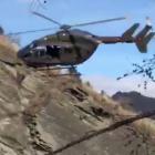 Flying into trouble? A still from video showing helicopters flying in  Skippers Canyon. Image:...