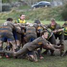 Strath Taieri halfback Stu James throws a dive pass in his team's match against Green Island on a...