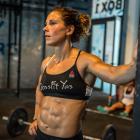 Crossfit competitor Jamie Greene takes a break during a workout at her gym in Abu Dhabi. PHOTO:...