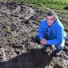 Saddle Hill Community Board chairman Scott Weatherall yesterday inspects an area of Brighton...