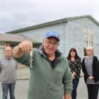 Lake Roxburgh Village hall committee chairman John Clarke holds the keys of the building newly...