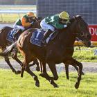 Nashville and apprentice jockey Kate Cowan swoop past their rivals on their way to winning the...