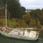 The Portland, beached on the Owaka River. Photo: Samuel White.