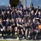 The Pirates women's team celebrates its win against University in Dunedin on Saturday. Photo:...