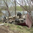 Lucky escape ... The driver and 48 bobby calves avoided injury when this stock truck veered off...