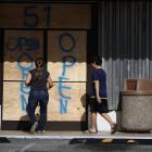 A business is prepared for Hurricane Irma with boarded up windows and doors on September 7, 2017...